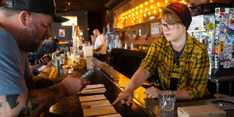 Nickel On A Dime: How One Austin Bar Tried To Make Ends Meet Through Deliveries