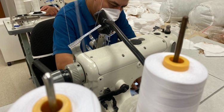 Companies and families work to produce mass quantities of protective masks