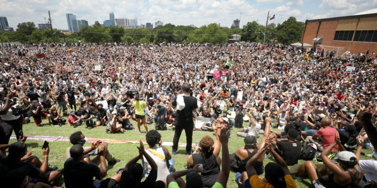 Thousands Rally In Austin For Economic Justice And An End To Police Violence