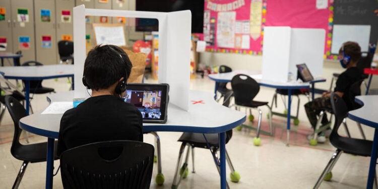 Zoom Dances And Temperature Checks: Here’s What A Day In An Austin ISD Elementary School Looks Like