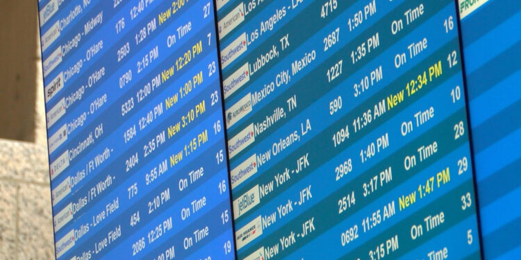 Travelers pass through Austin airport ahead of Thanksgiving