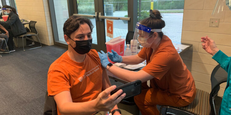 Front line health care workers encouraged by COVID-19 vaccine