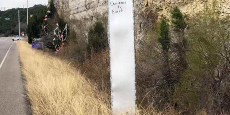Monolith with Christmas message appears along 360 Loop in Austin, Texas