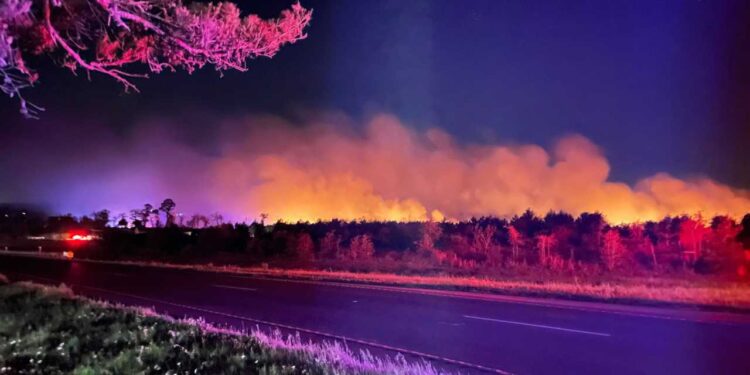 Bastrop County wildfire 100% contained, but still expect to see smoke rising from the area