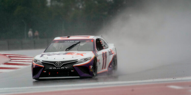 Fans endure Saturday downpours to watch NASCAR’s debut in Austin