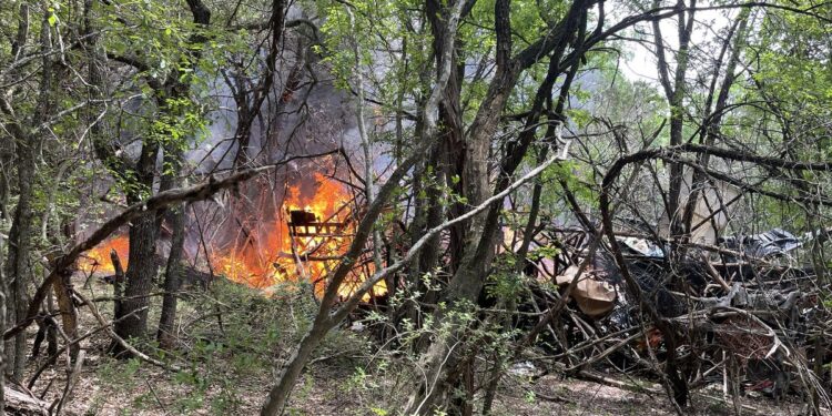 Fire burning in south Austin woods Friday afternoon